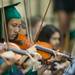 A graduate plays the violin with the Huron symphony orchestra during Huron's class of 2013 graduation ceremony at the Convocation Center.
Courtney Sacco I AnnArbor.com 
 